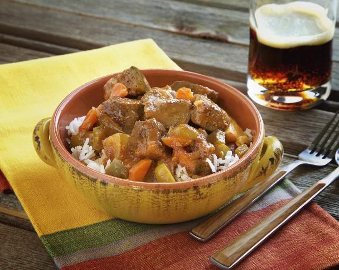 step 14 Discard the bay leaf. Divide the rice evenly between two bowls. Top with the beef and potato stew. Serve and enjoy!