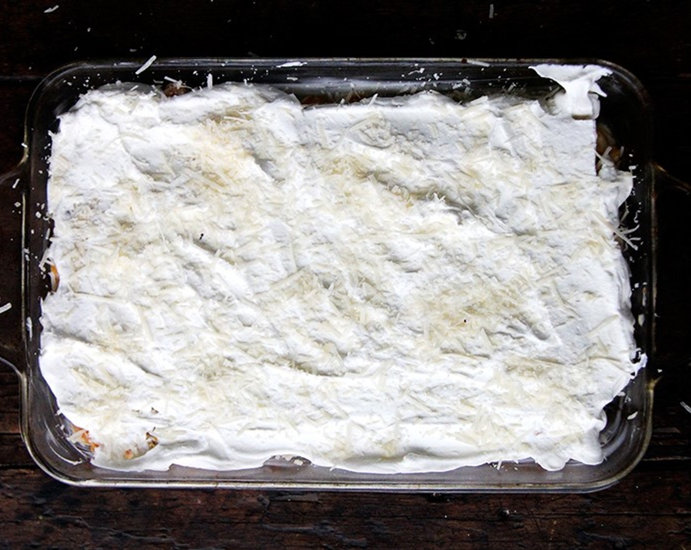 step 12 Sprinkle remaining Parmesan Cheese (1/3 cup) over cream. Cover dish tightly with foil, tenting slightly to prevent foil from touching top layer, and bake in middle of oven 30 minutes.