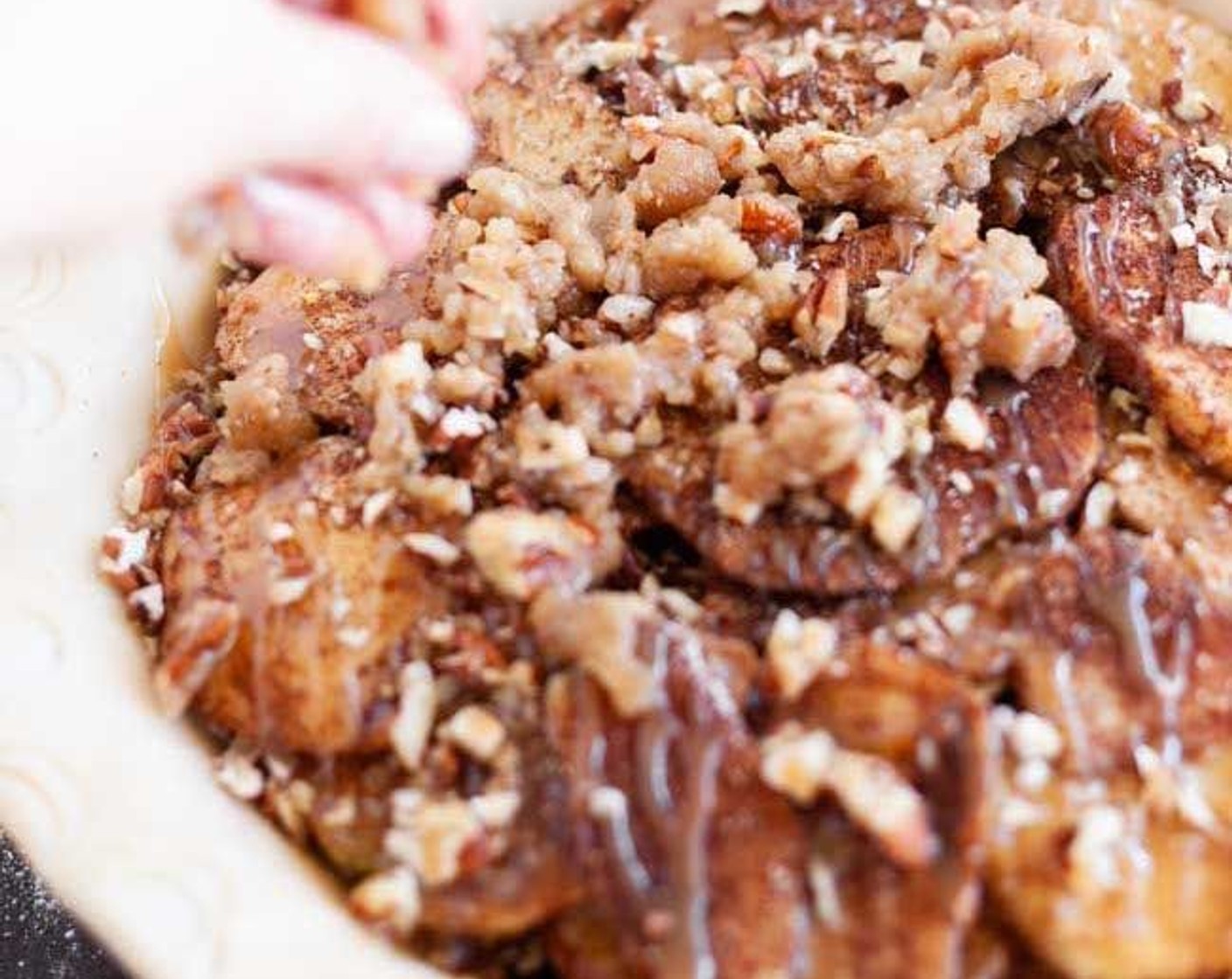 step 8 Combine Pecans (1 cup), Butter (1/2 cup), Brown Sugar (1 cup), and All-Purpose Flour (1/3 cup) in a bowl. Stir well and crumble over the top of your apples.