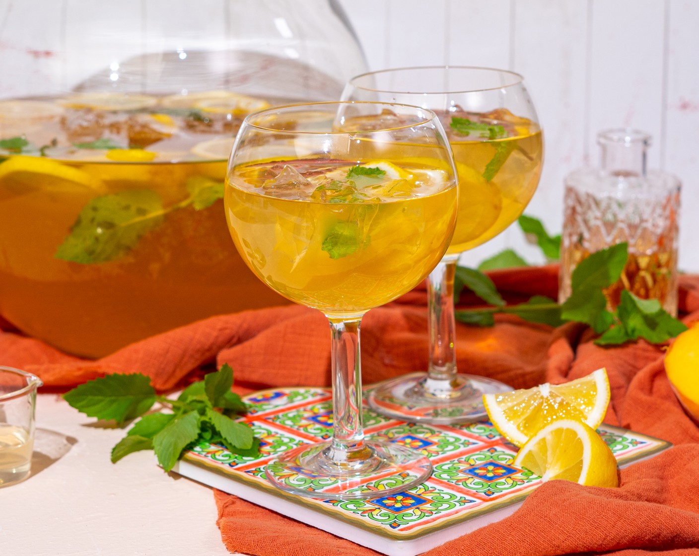 step 3 Ladle the punch into the serving glass with more ice if needed. Garnish with lemon slices and Fresh Mint (to taste).