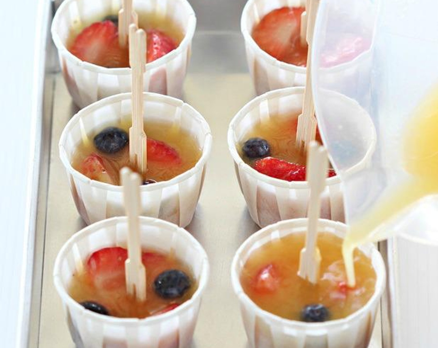 step 1 Combine Orange Juice (2 cups) and juice from Lime (1/2) in a measuring cup. Add Granulated Sugar (1/4 cup) to taste, and stir until dissolved.