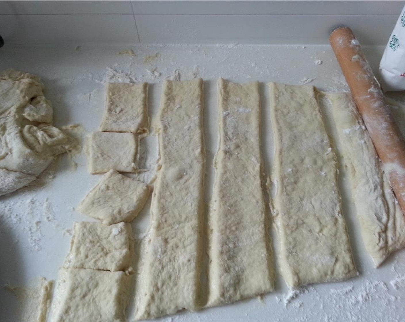 step 8 Roll the dough out to about 1/4-inch thickness and cut into 1-inch squares. I decided to go a little larger than 1-inch. The size is up to you.