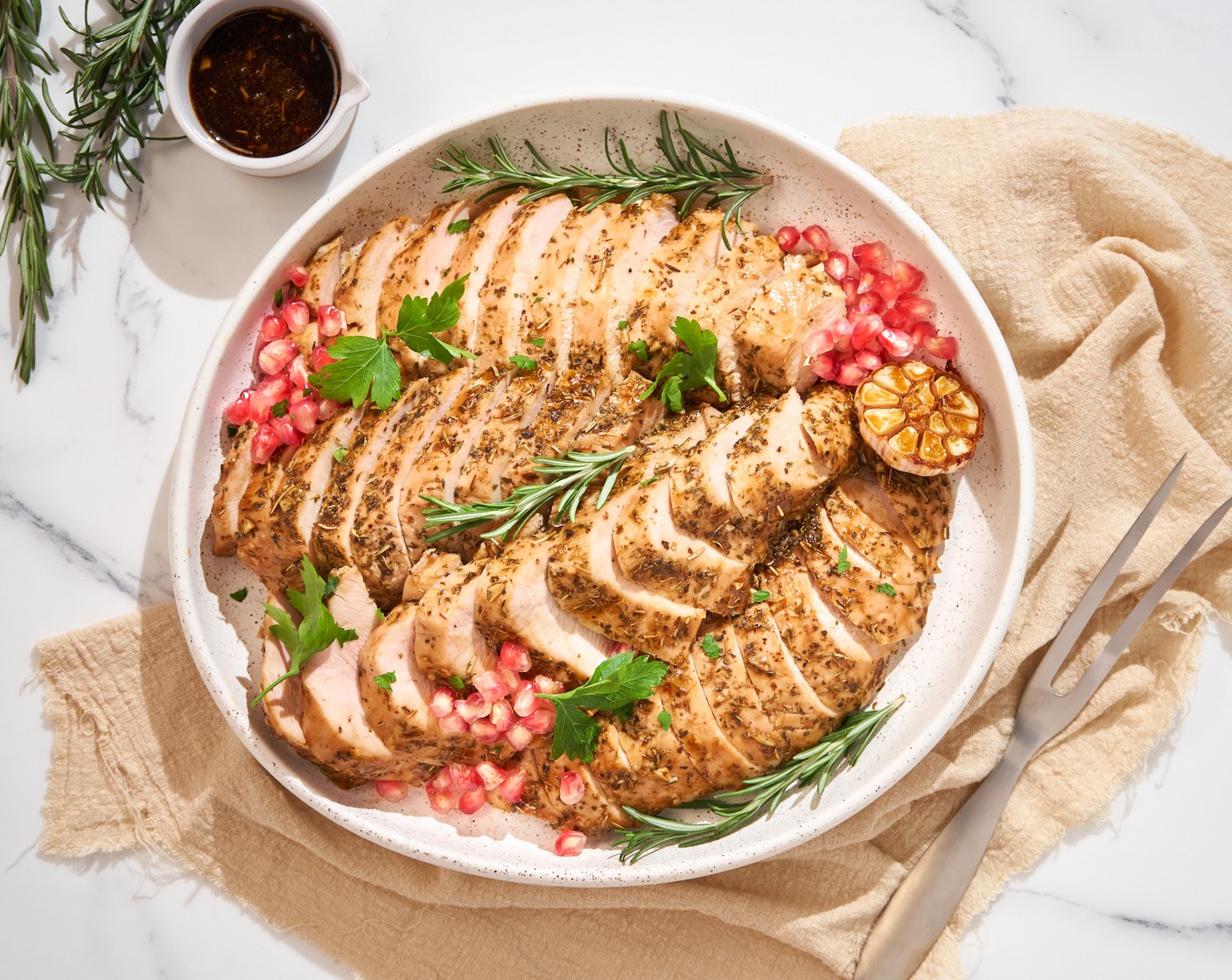 step 9 Slice the breast and place it on a nice serving platter. Decorate as you will, then serve and enjoy with Pomegranates (to taste), Garlic (to taste), Fresh Parsley (to taste), Fresh Rosemary (to taste), or other optional garnishes.