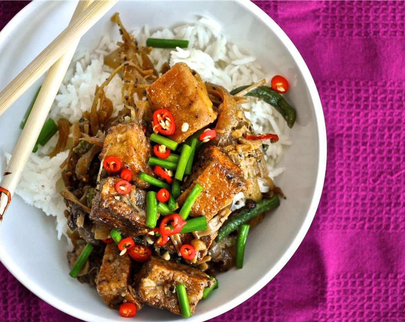 step 10 Toss tofu and vegetables in the sauce and heat everything up for 1-2 minutes. Serve over rice and garnish with some thinly sliced Fresh Chives (to taste) or green onions.