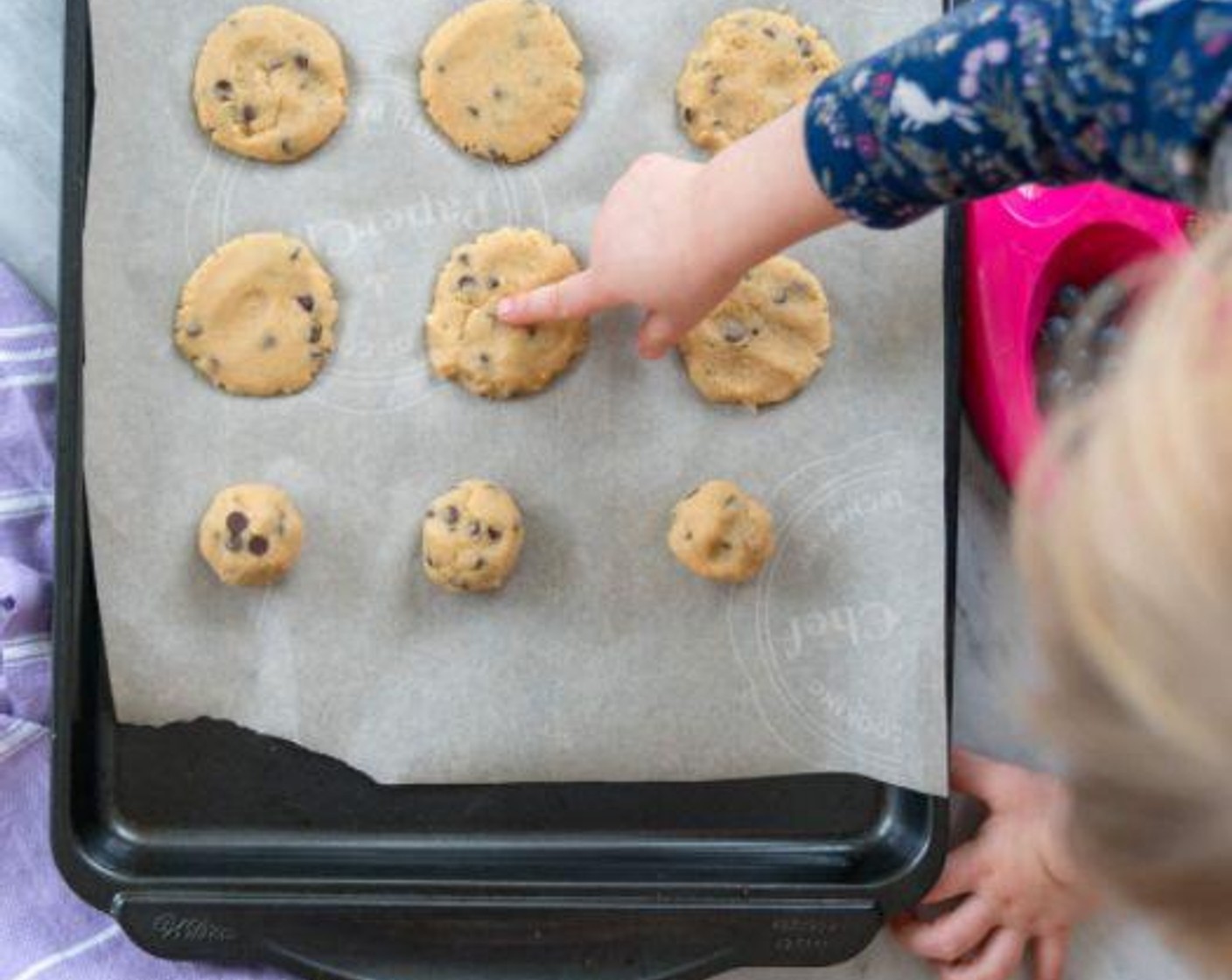 step 5 Roll the batter into 1-inch balls and place on cookie sheet. Flatten with your hand so they are an even thickness. This will help them sit better when you make the sandwiches.