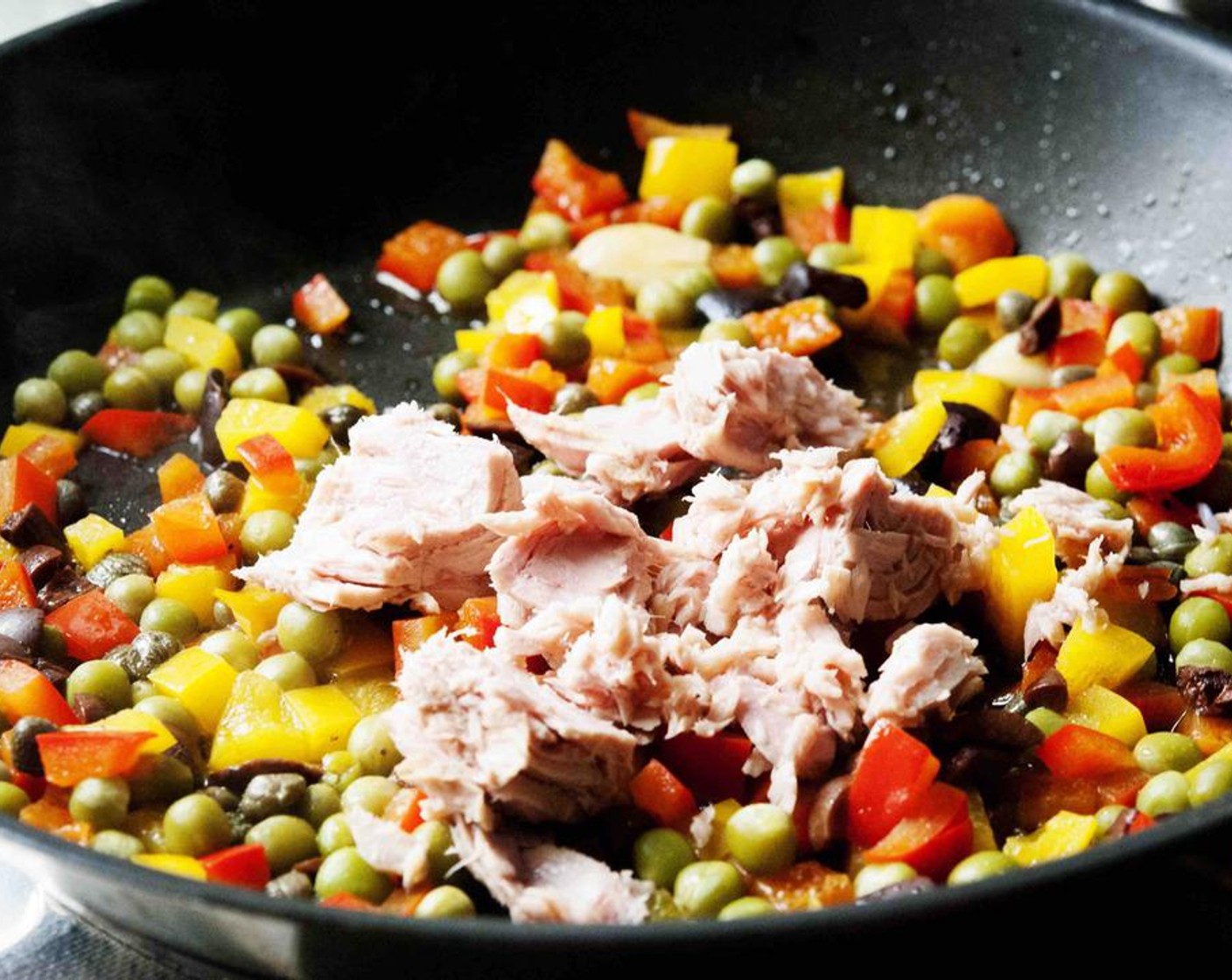 step 5 Remove from the heat and stir in the Canned Tuna (1/3 cup). Make sure to leave some bigger chunks for more flavor.