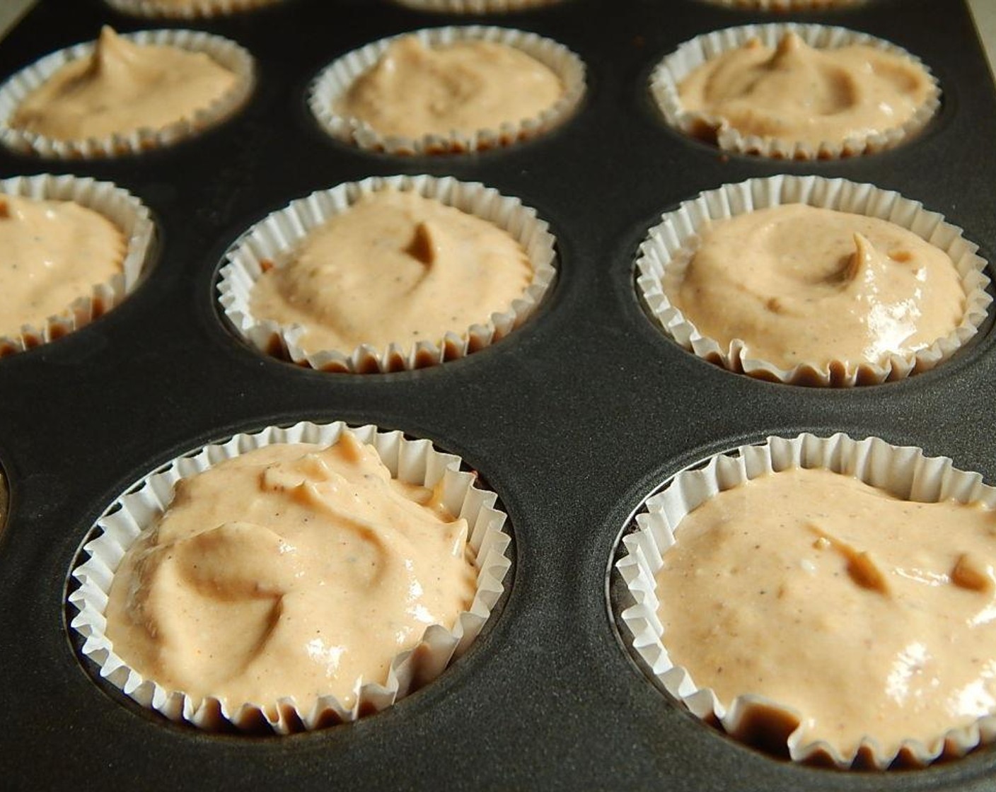 step 4 Use an electric mixer to beat together Light Cream Cheese (3/4 cup), Granulated Sugar (1 Tbsp), All-Purpose Flour (1/2 Tbsp), Eggs (2). Canned Pumpkin Purée (1/4 cup), Vanilla Extract (1/2 tsp), and Ground Nutmeg (1/2 tsp). Spoon into muffin liners. Bake in oven for 14 minutes.