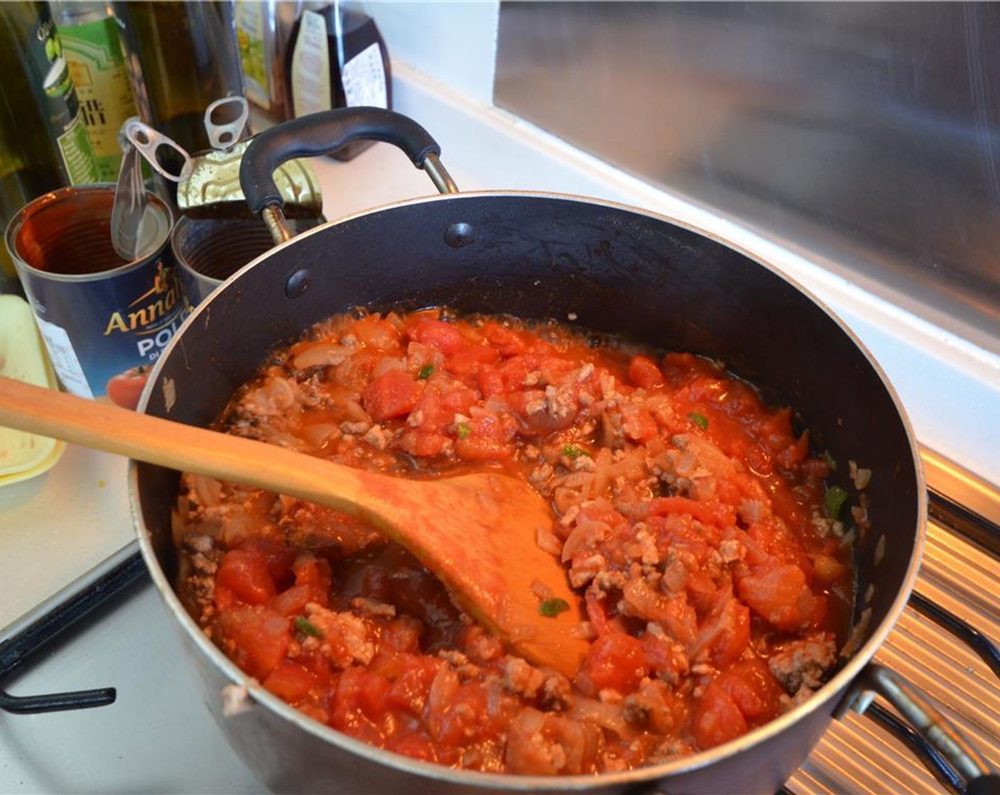 step 8 Add Salt (to taste) and Ground Black Pepper (to taste) to your liking. Reduce heat to medium and cook for 45 minutes. Stir occasionally, adding water if it becomes too dry.