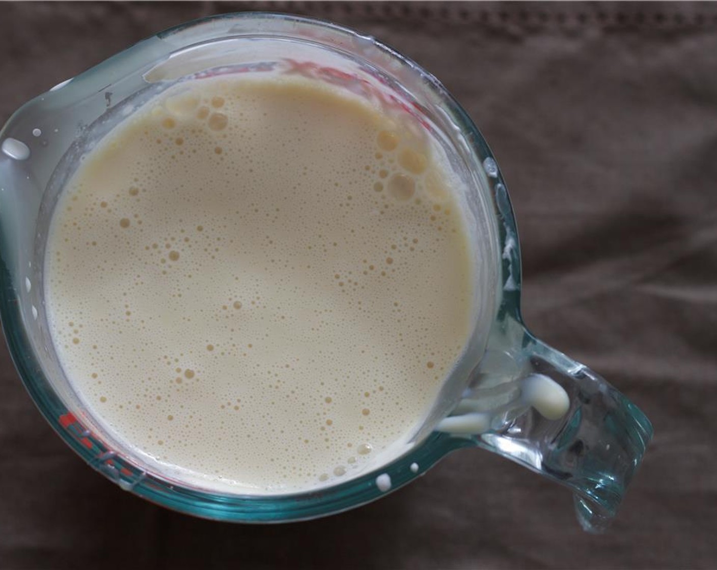 step 3 In a separate bowl, beat the Sour Cream (3/4 cup) and Sweetened Condensed Milk (1 1/3 cups) until thoroughly combined.