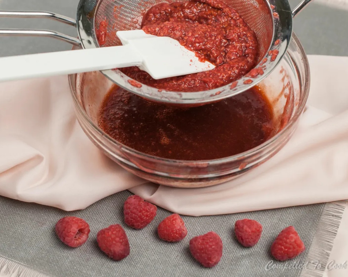 step 3 Strain using a fine mesh sieve, pressing solids against the sides to expel as much juice as possible. Discard solids and stir reduced balsamic vinegar and Pure Vanilla Extract (1/2 tsp) into raspberry juice. Cool until chilled.