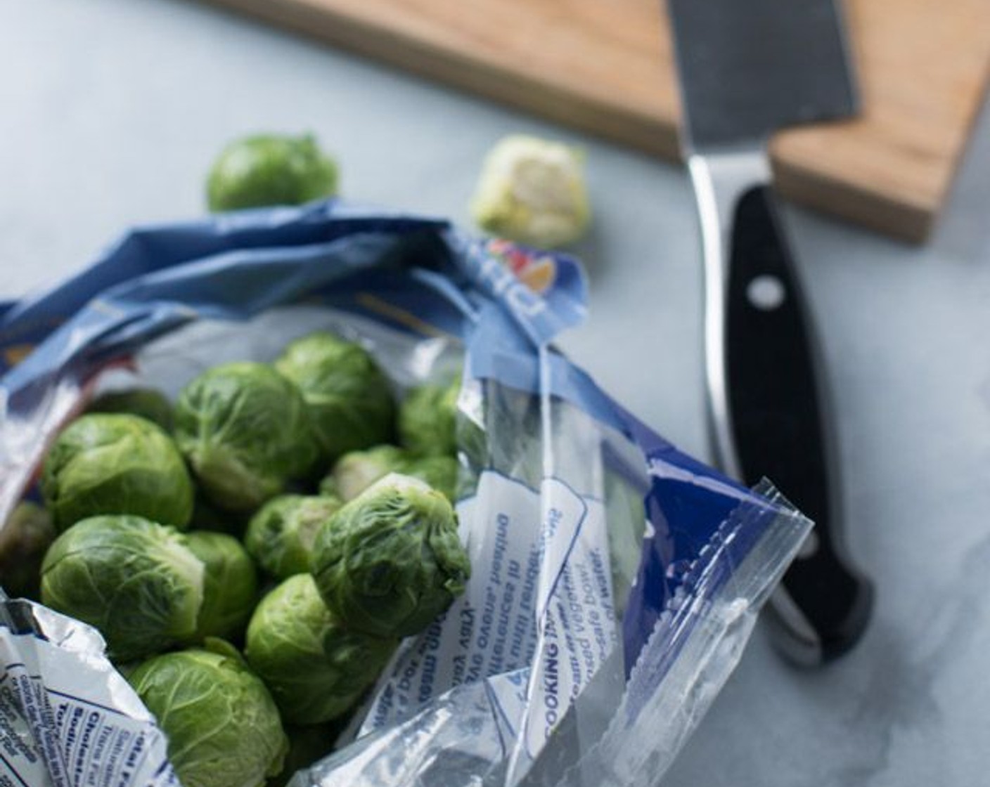 step 2 Clean and chop Brussels Sprouts (5 cups) into halves.