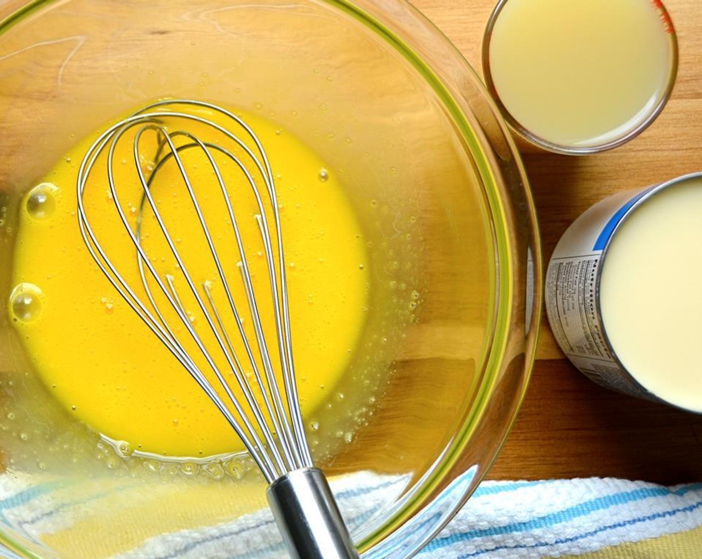 step 4 Place the Farmhouse Eggs® Large Brown Eggs (6) in a medium bowl and whisk them together.