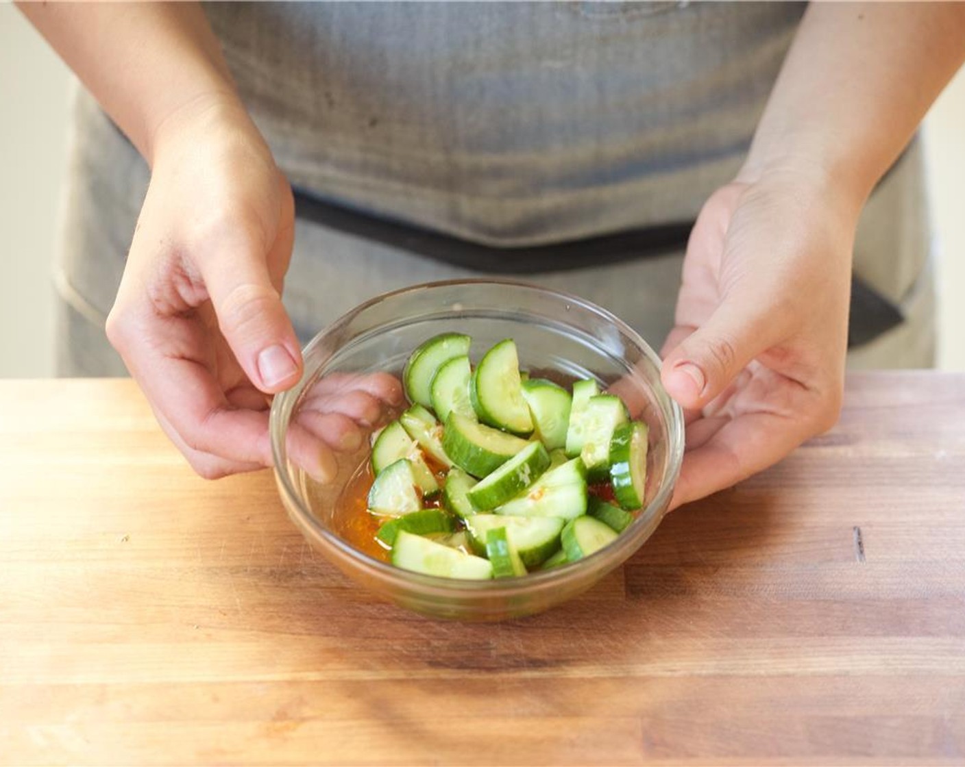 step 6 Rinse the salt off the cucumber and pat dry. Add to the bowl with vinaigrette, mix to combine, and set aside.