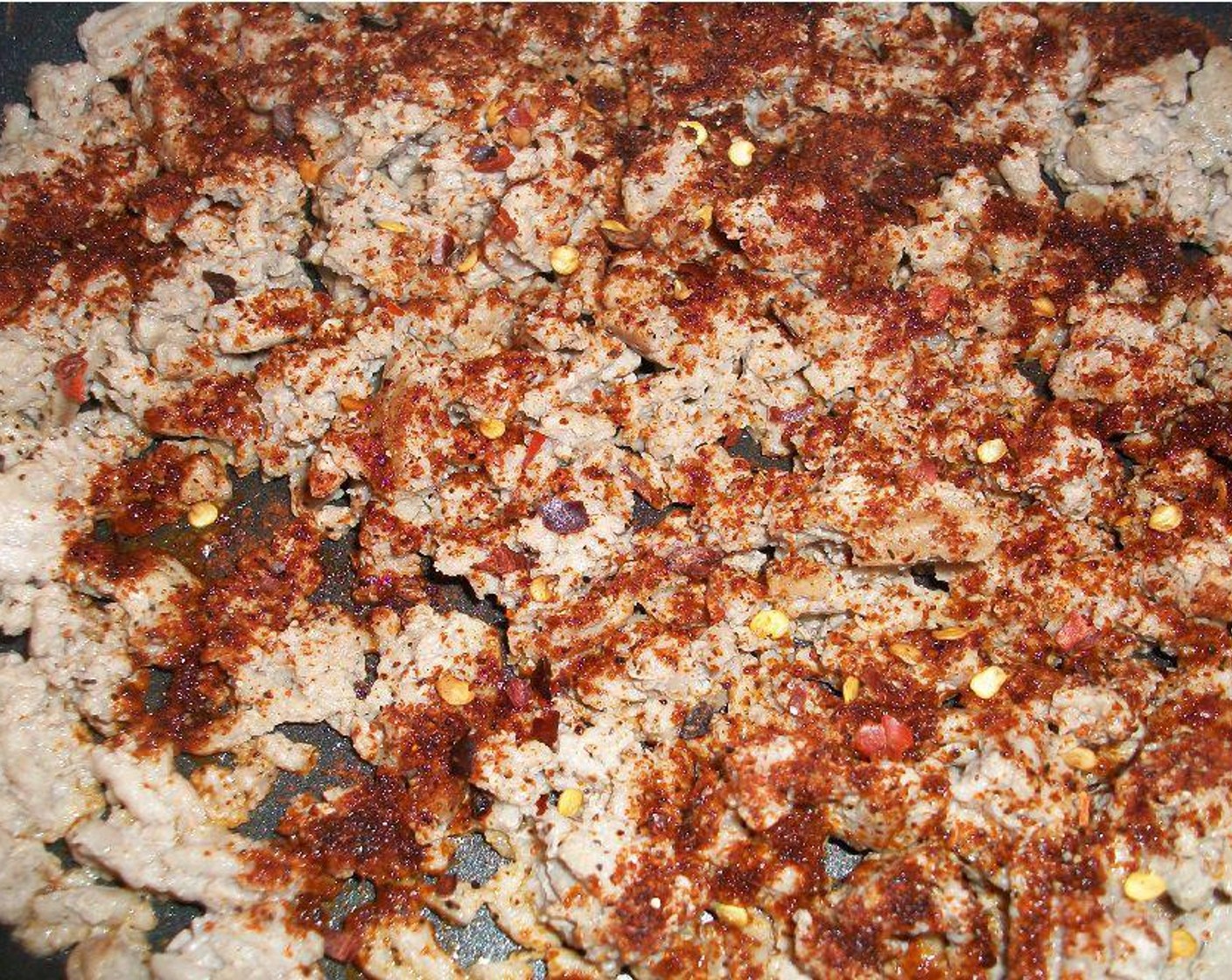 step 1 Start by browning Ground Turkey (8 oz). Add Chili Powder (2 tsp), Ground Black Pepper (1 tsp), and Crushed Red Pepper Flakes (to taste).