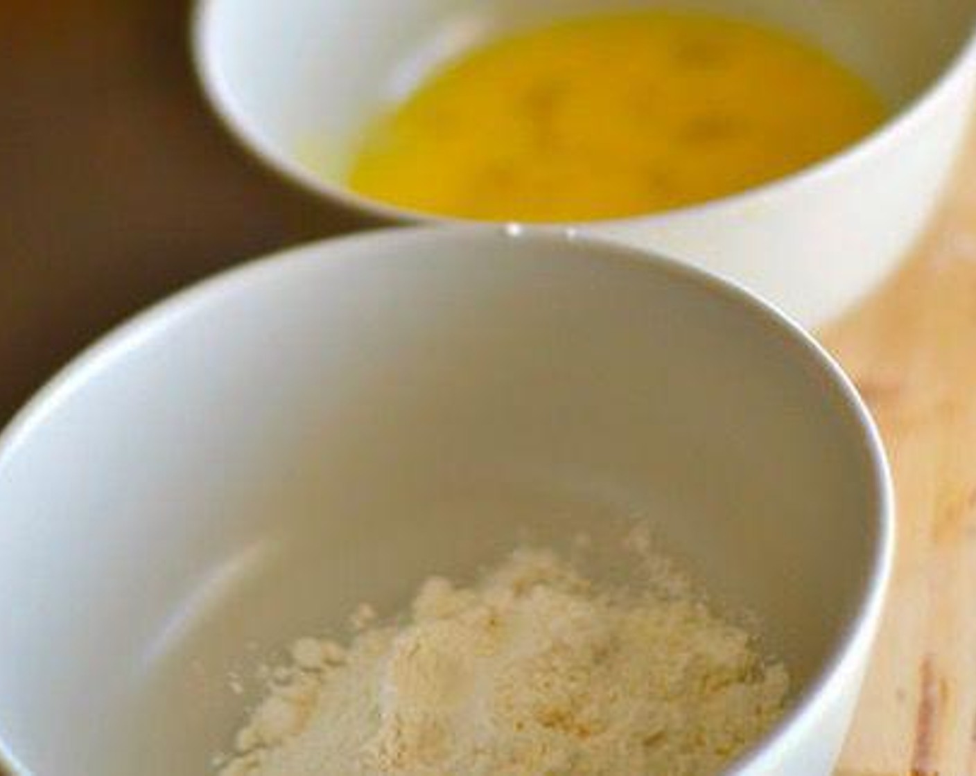 step 5 Prepare your workstation; three bowls, one with All-Purpose Flour (3/4 cup), the second with Eggs (2), and the third with Breadcrumbs (2 cups).