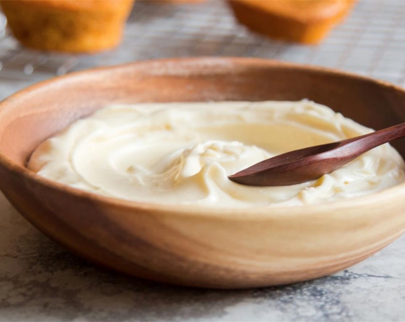 step 6 Prepare the frosting. In a large bowl, use an electric whisk (or a stand mixer fitted with a paddle attachment), to slowly beat the Unsalted Butter (3/4 cup) and gradually add the Powdered Confectioners Sugar (2 1/2 cups).