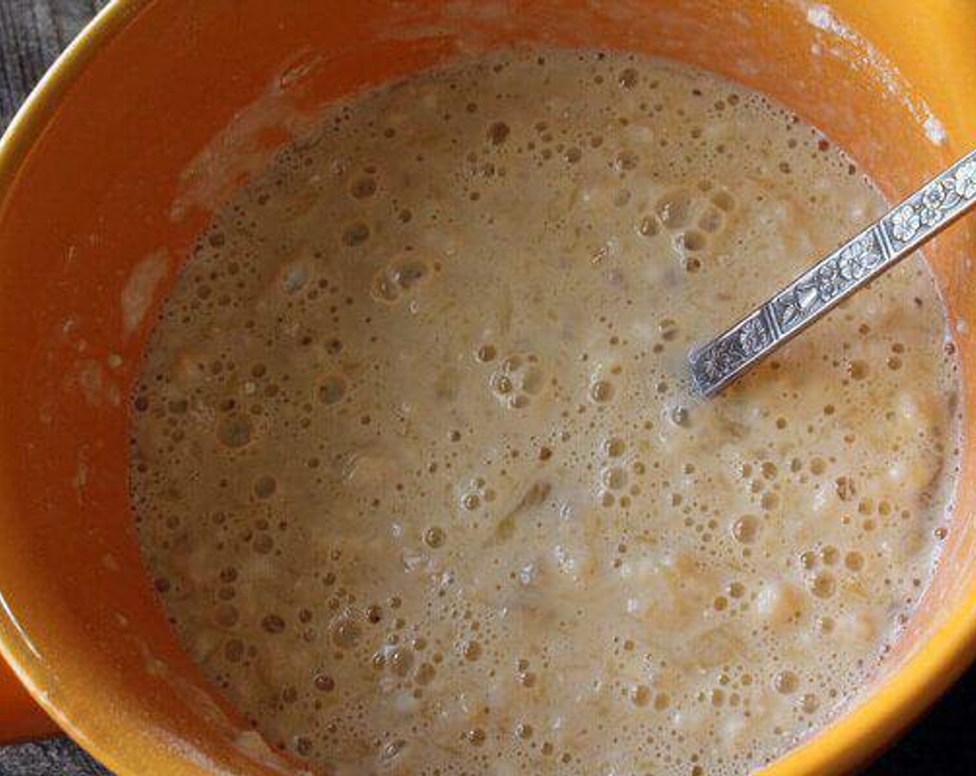 step 3 Slowly add wet ingredients to the dry mix. Stir slowly until just combined, leaving lumps. Let batter sit 10 minutes.