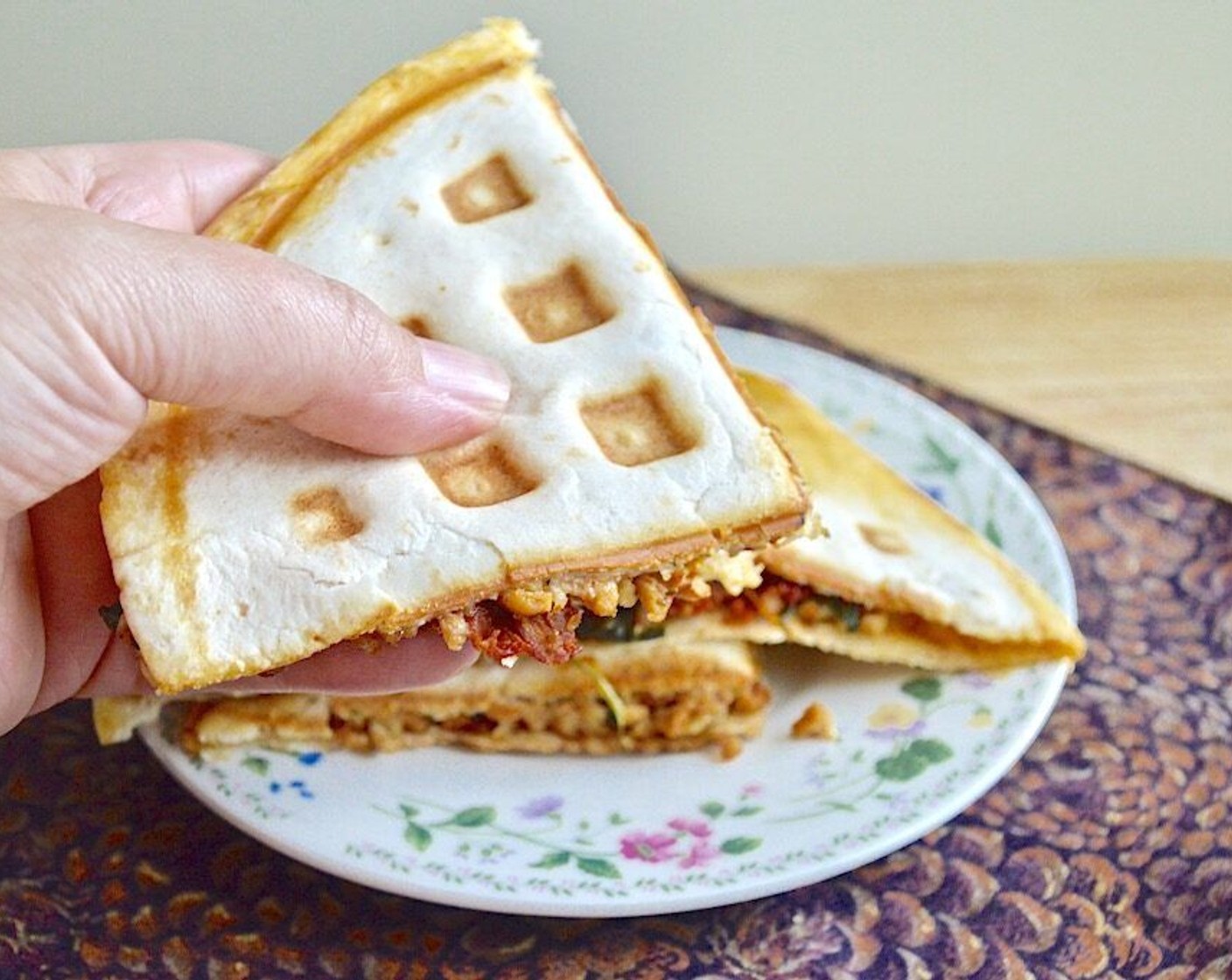 step 7 While it is cooking, assemble the next one so that it is ready. When the first one is done, cut it into quarters and serve it immediately, with warmed up marinara if you wish! Repeat the process with the remaining 5 quesadillas.