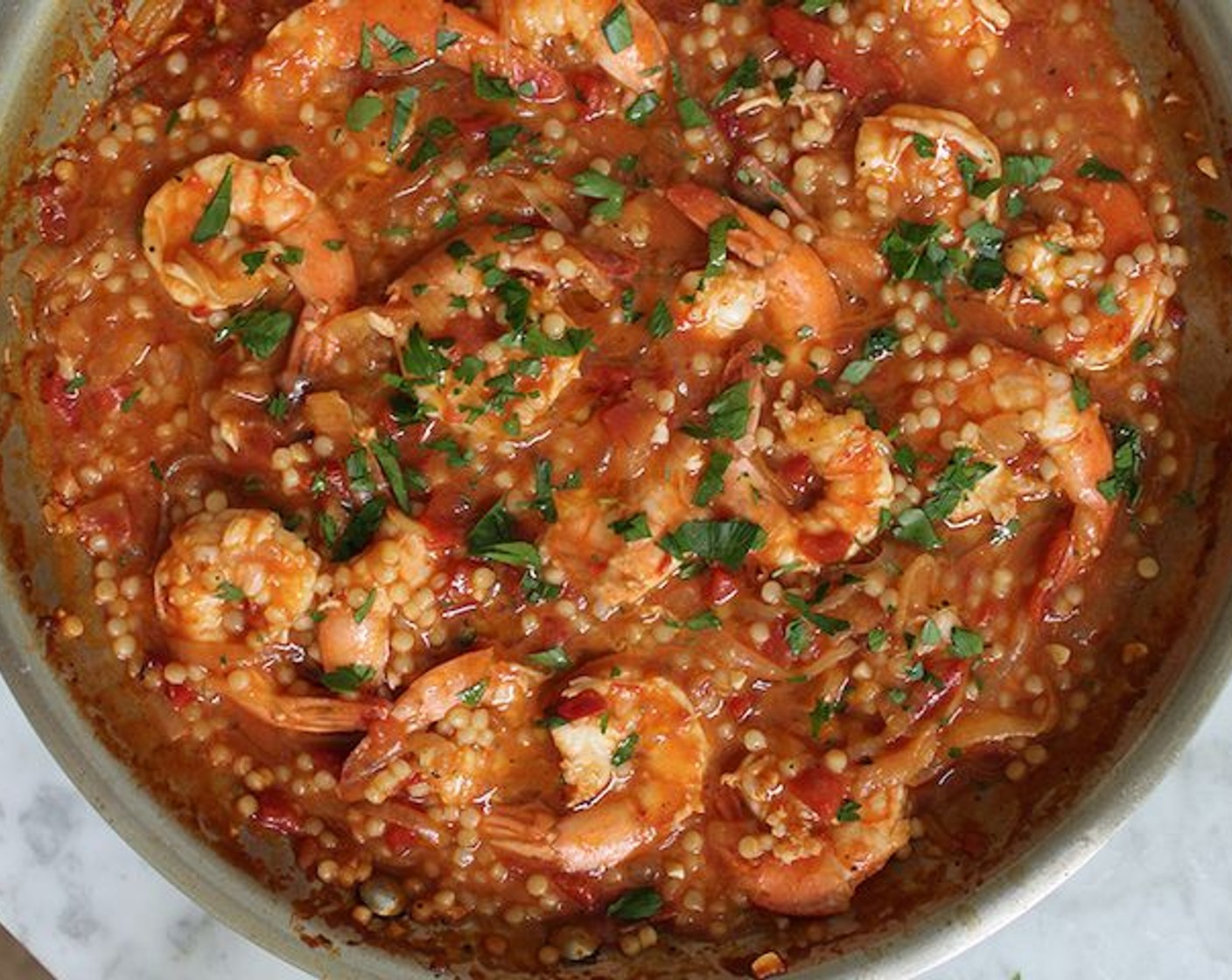 step 7 Serve hot in shallow bowls. Garnish each serving with Fresh Parsley (to taste) and a drizzle of olive oil.