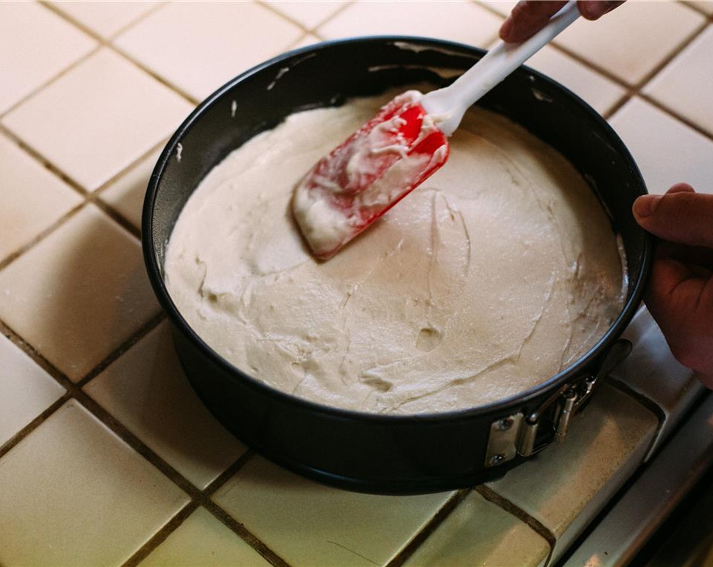 step 6 Transfer batter to the prepared cake pan and spread to evenly fill pan and smooth top. Bake until set and toothpick inserted in the center comes out clean, about 25-30 min. Let cool thoroughly, at least 1 hour. Meanwhile, prepare frosting.