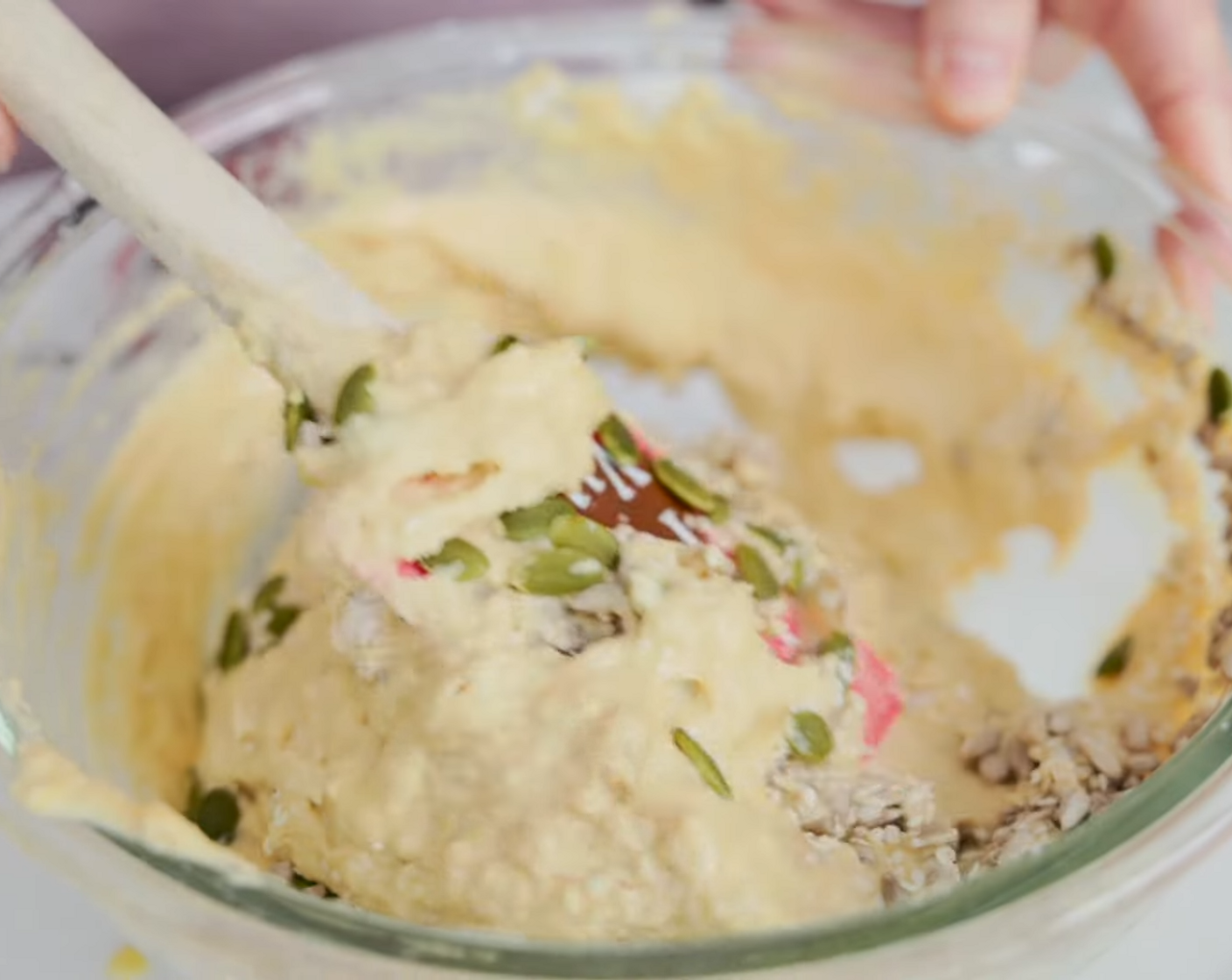 step 4 Pour wet ingredients into dry ingredients and mix. Add Pepitas (1/4 cup), Sunflower Seeds (1/4 cup), and Sesame Seeds (2 Tbsp) and fold into batter. Let the batter settle for a few minutes so coconut flour absorbs all the liquid.