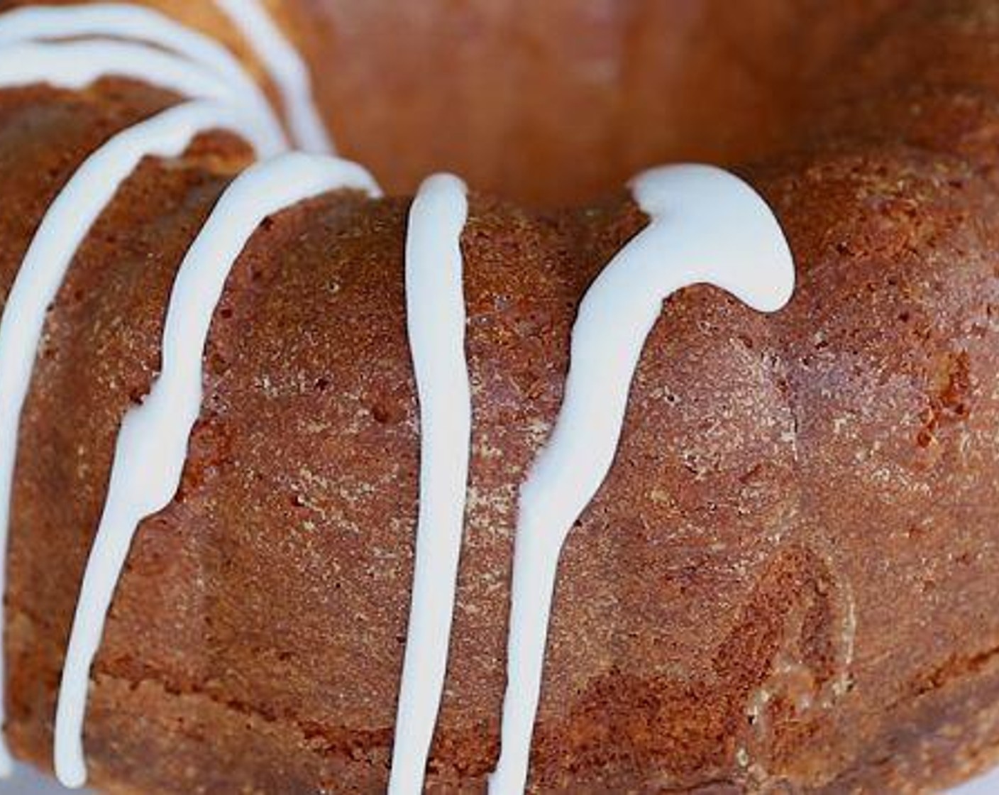 step 5 Make glaze by mixing Powdered Confectioners Sugar (1 cup) and Lemon Juice. Allow pound cake to cool completely. Once the pound cake is cooled, drizzle over the lemon glaze.