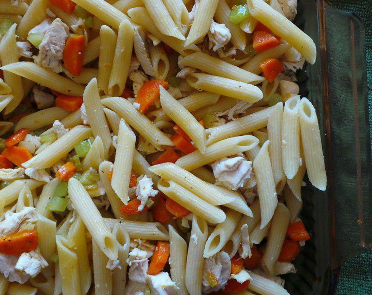step 4 Once the vegetables are soft and your noodles are finished, toss together with the Chicken (2 cups).