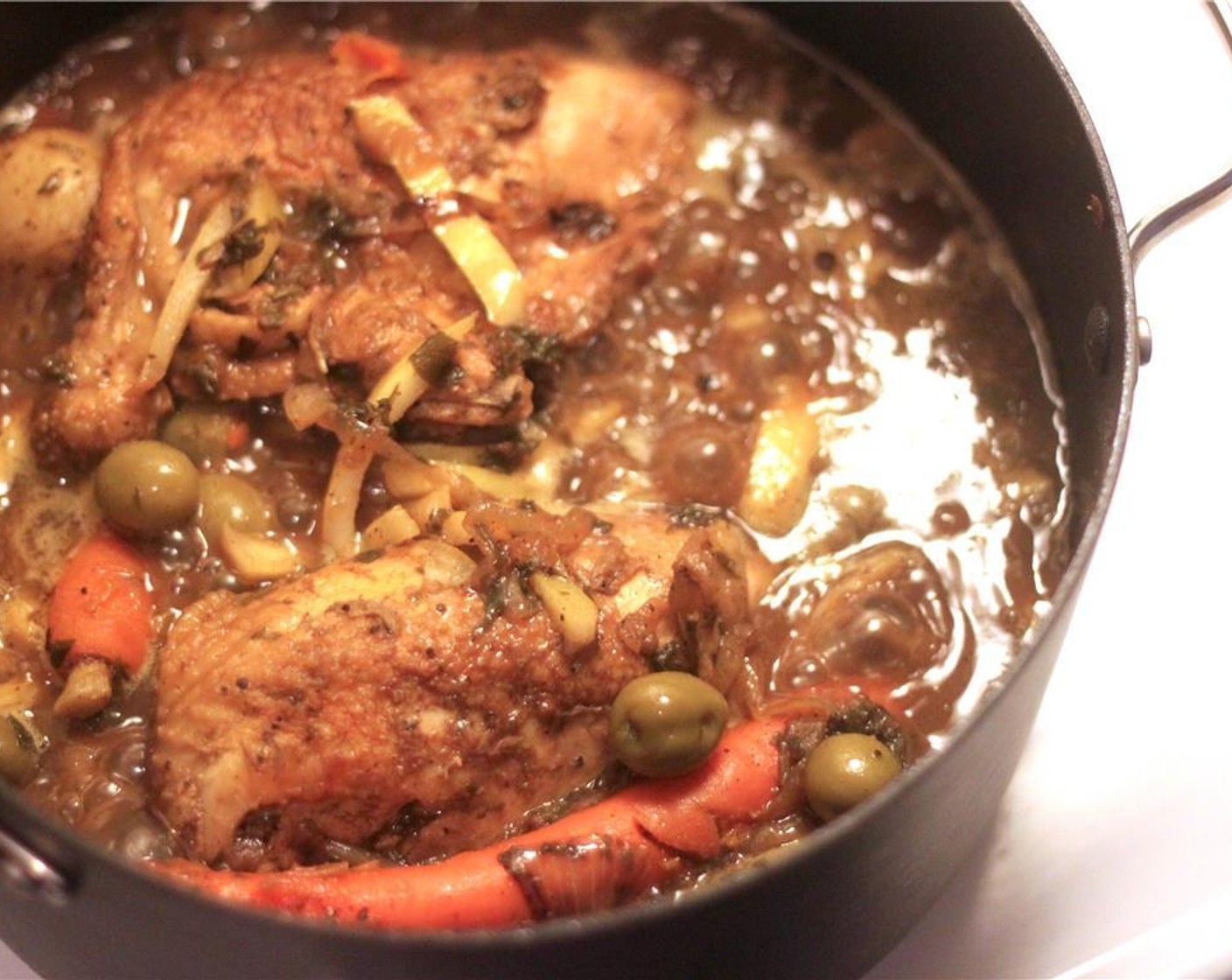 step 11 Transfer the covered pot to the oven to braise for about 25 minutes.