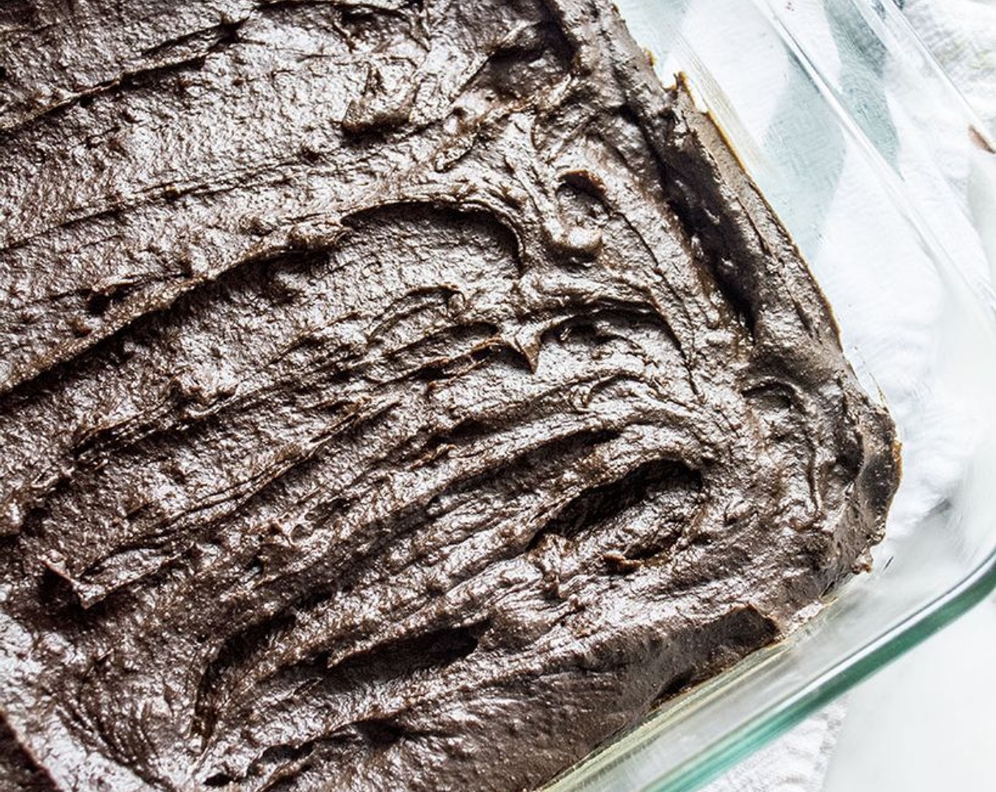 step 6 Add batter to greased dish and bake 18-20 minutes or until toothpick inserted around outer section comes out clean. I like to bake mine right at 18 minutes, leaving them a little underdone so they're really fudgy!