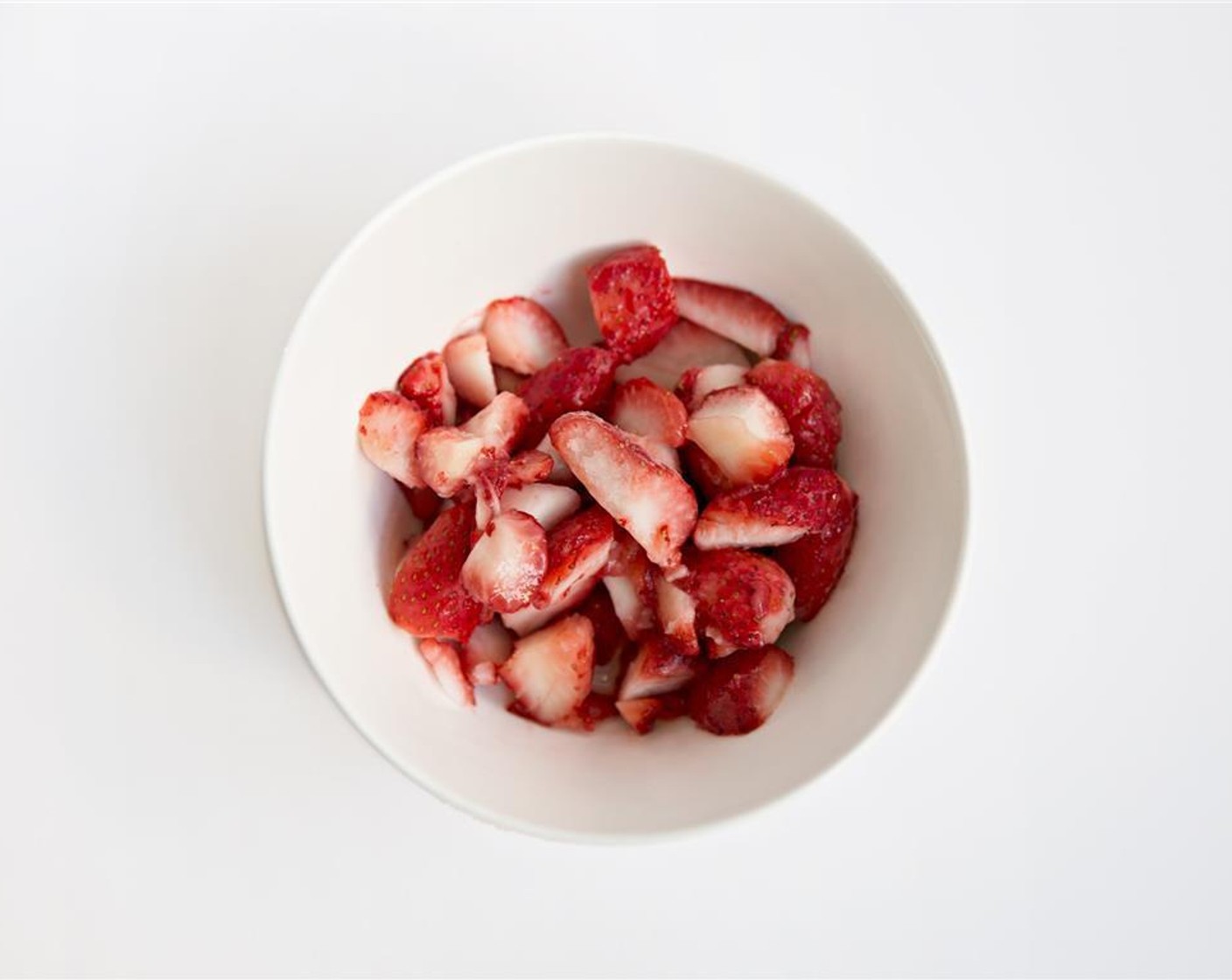 step 1 Chop hulled Frozen Strawberries (3 cups). Combine strawberries with Granulated Sugar (1/4 cup) and let stand for 20 minutes, stirring occasionally.