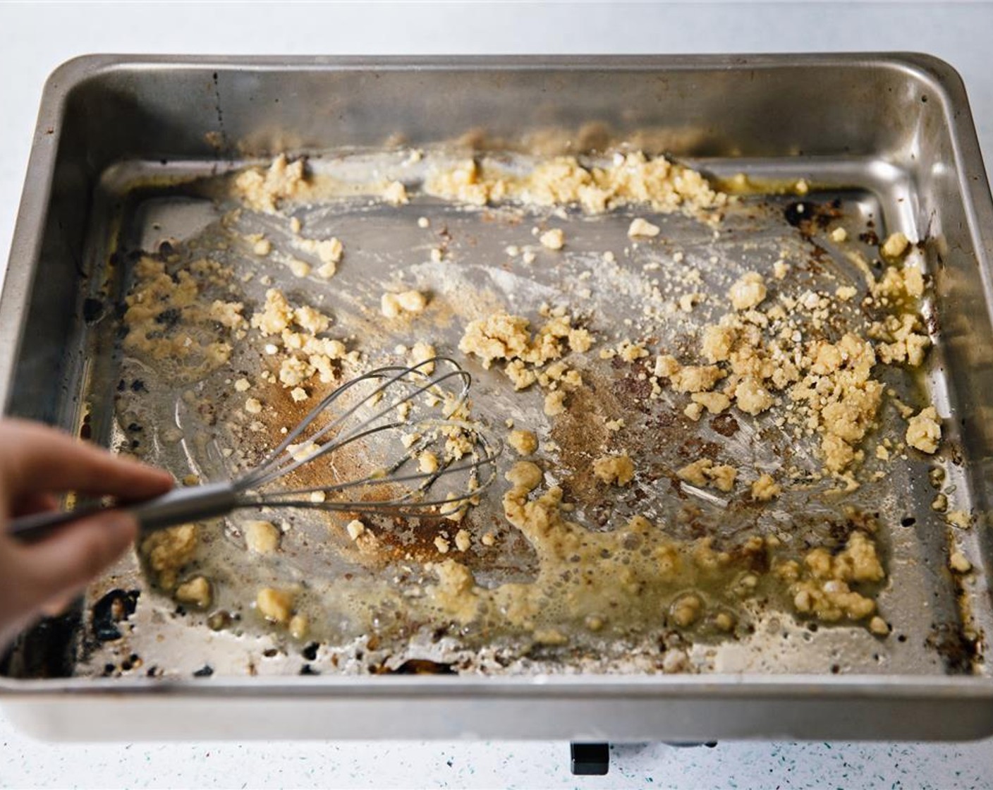 step 5 Continue to whisk flour and oil into clumps.