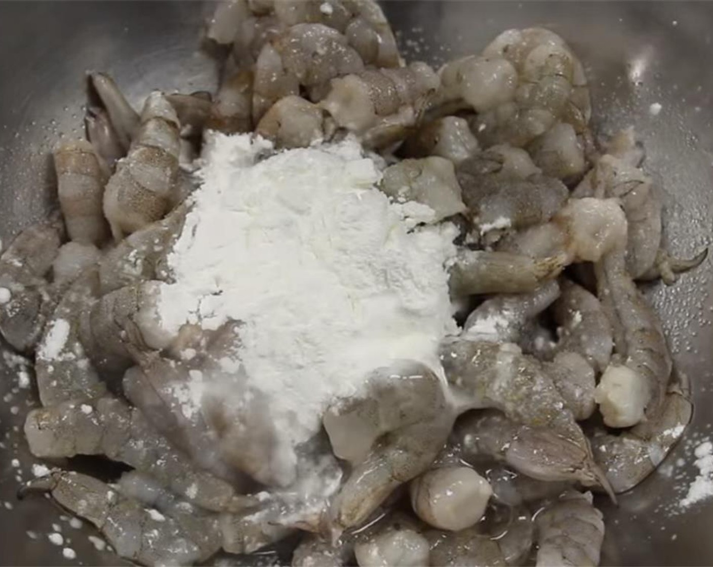 step 3 In a large bowl, add the deveined shrimp, Salt (3/4 tsp), Corn Starch (1 Tbsp), Water (1/2 Tbsp), and mix.