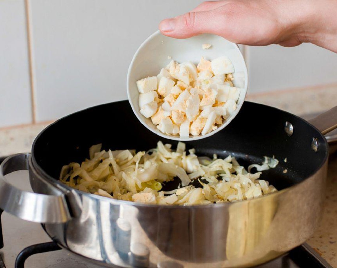 step 4 Once cooled, mix the cabbage with the dill and eggs. Add Salt (to taste) and Ground Black Pepper (to taste).