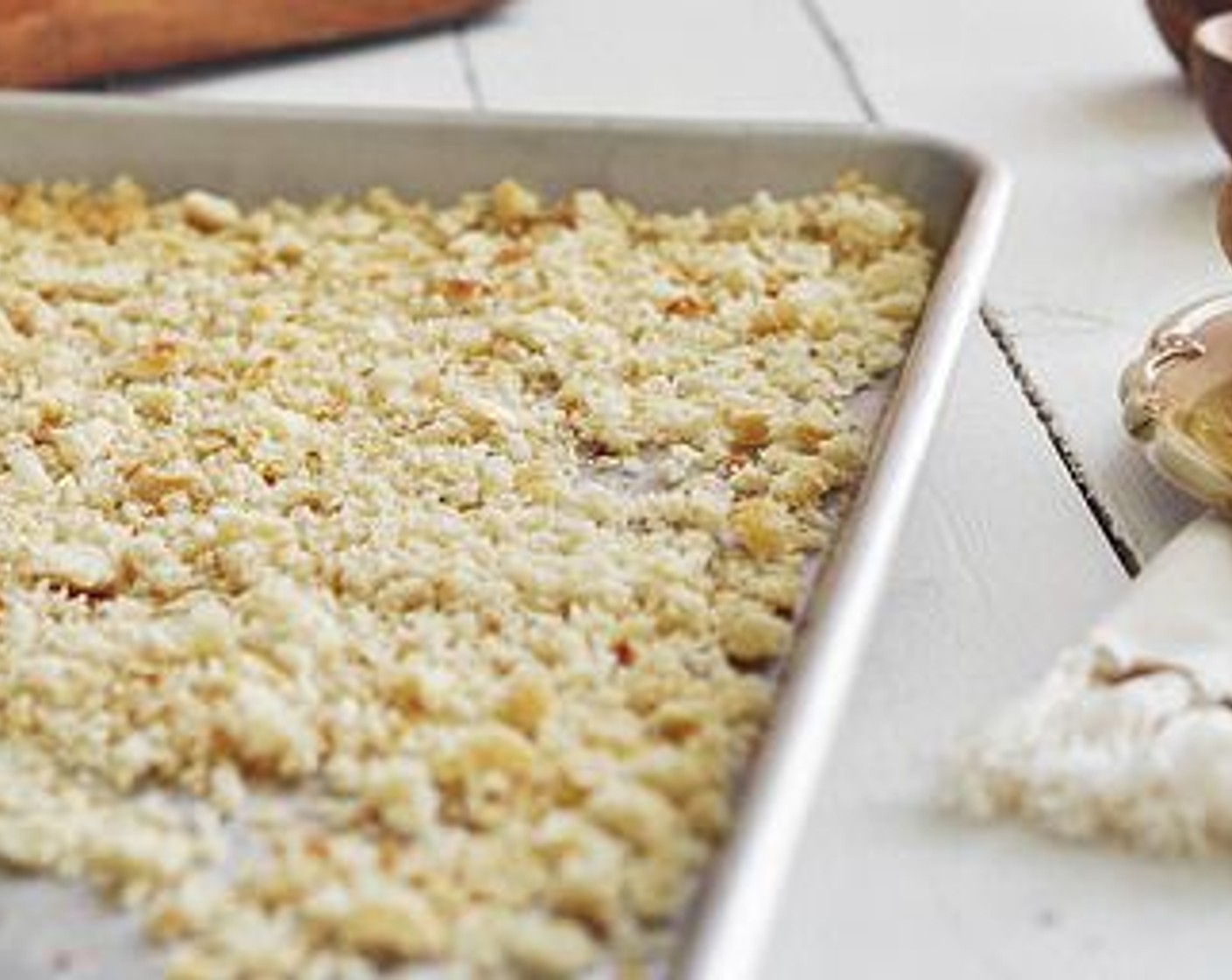 step 7 Process the Bread (5 slices) in a food processor until it resembles coarse crumbs. Dump out onto a baking sheet and bake for about 2 to 5 minutes until golden brown and crispy. Remove from the oven and allow to cool.