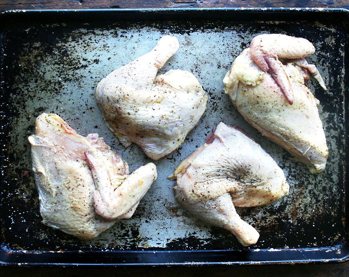 step 8 Rub the chicken with Olive Oil (1 Tbsp) and season liberally all over with Kosher Salt (to taste) and Freshly Ground Black Pepper (to taste). Arrange, skin-side up and roast until golden, about 30 minutes.
