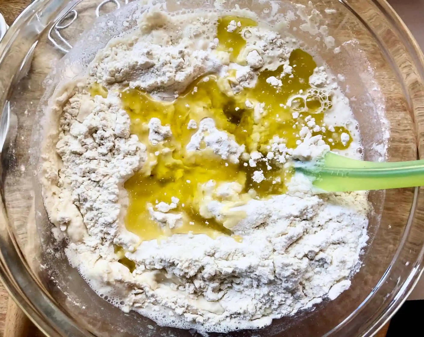 step 1 In a large bowl, whisk together the Unbleached All Purpose Flour (6 cups), Kosher Salt (1 Tbsp), Granulated Sugar (1 Tbsp), and Instant Dry Yeast (1 Tbsp). Add the Water (3 cups), followed by the Neutral Oil (1/3 cup). Using a rubber spatula, mix until the liquid is absorbed and the ingredients form a sticky dough ball.