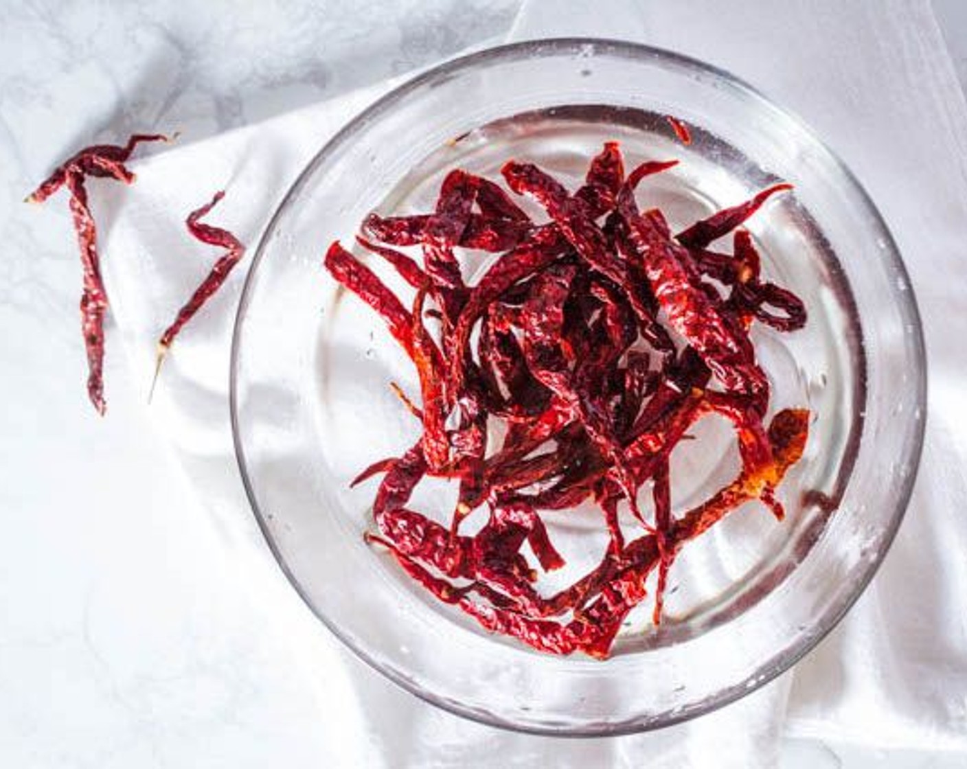 step 1 Soak the Dried Red Chili Peppers (15) in warm water for 30 minutes.