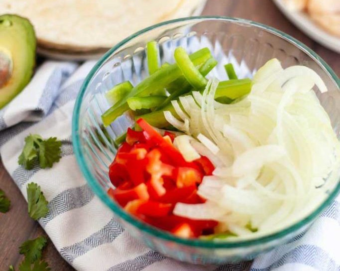 step 1 Place your Green Bell Pepper (1), Red Bell Pepper (1) and Onion (1) into a 2.5 quart dish that is microwave safe and has a cover.