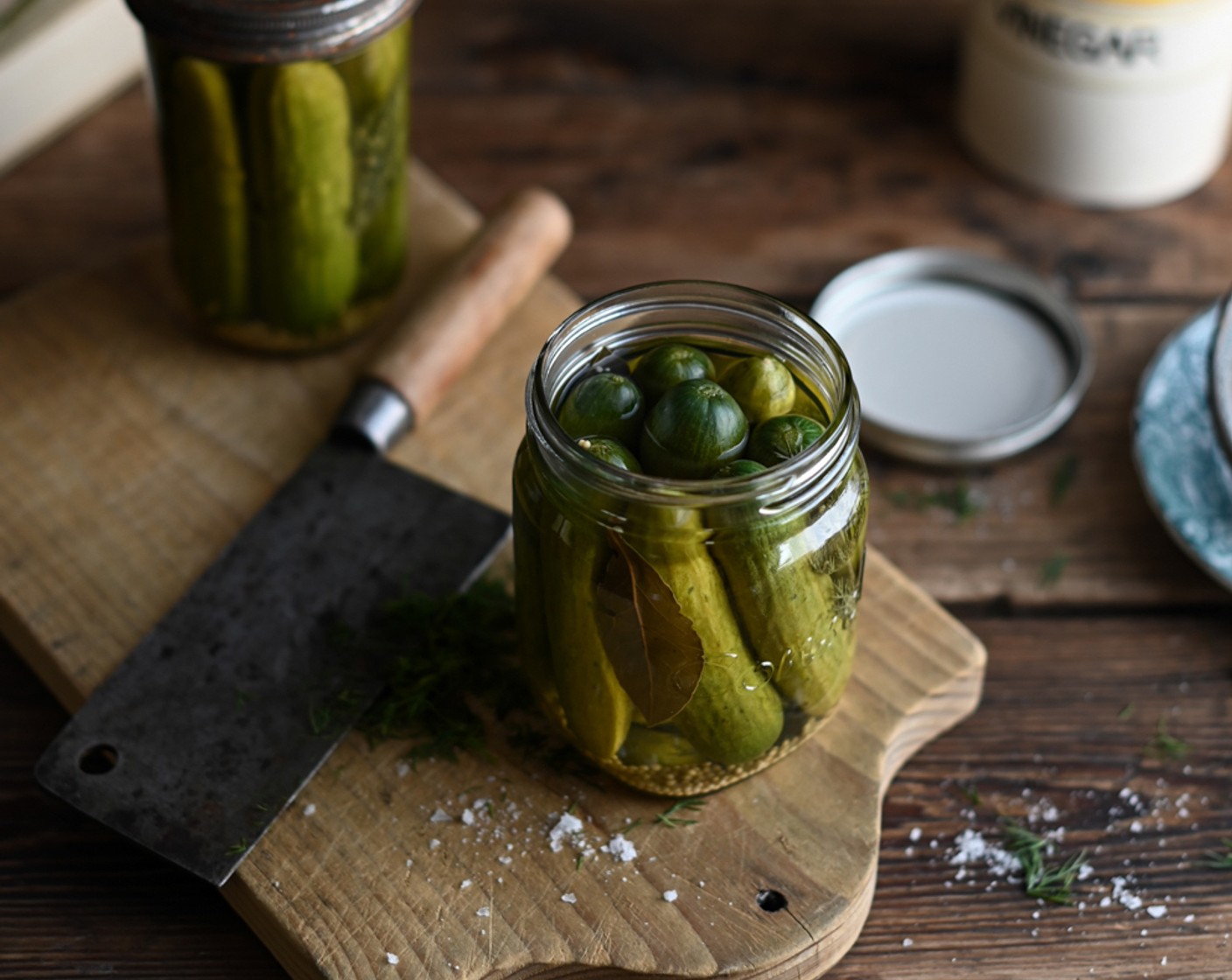 step 2 Pack the cucumbers tightly into a large, sterilized jar and pour over the brine, ensuring the cucumbers are completely covered. Tightly close the lid and leave the cucumbers to pickle for a week. Refrigerate after opening.