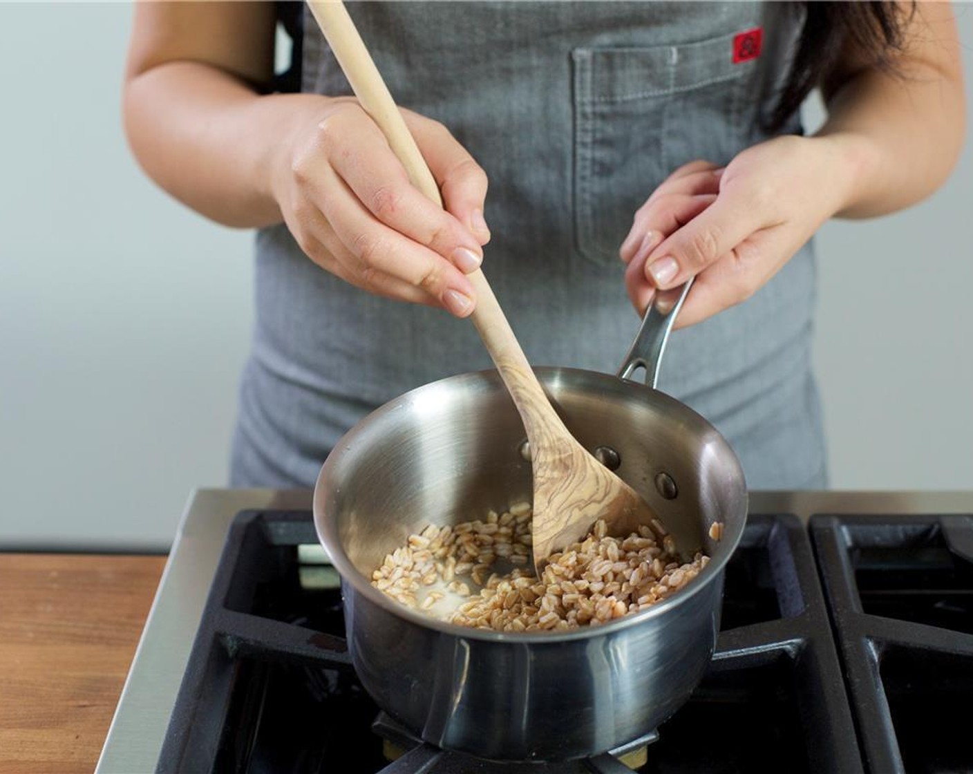 step 2 In a second medium saucepan over high heat, add Green Lentils (2/3 cup), two cups of cold water, Salt (1/2 tsp) and bring to a boil. Reduce heat to a simmer. Cover and allow to cook for fifteen minutes or until cooked through. Drain lentils and return to the pot.