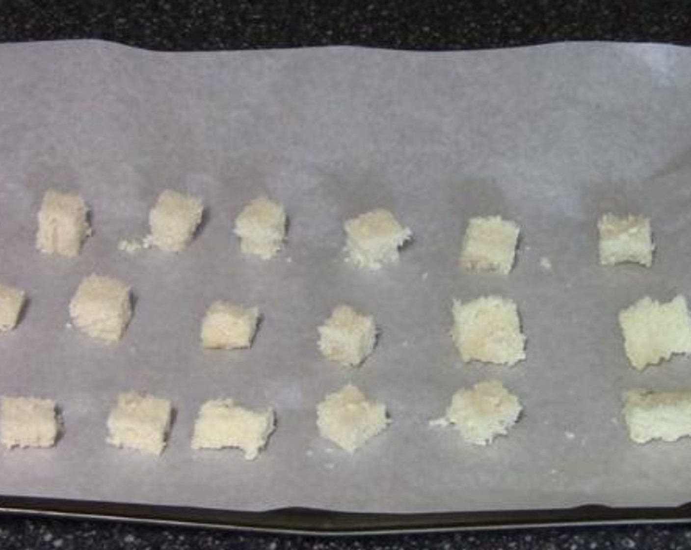 step 3 On a baking dish lined with baking paper, place the Bread (2 slices) and lightly coat them in Nonstick Cooking Spray (as needed). Bake them in the preheated oven for 5 minutes.