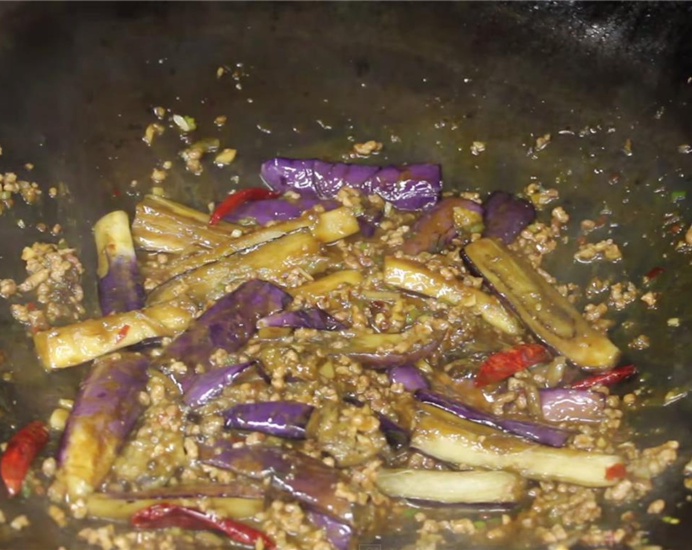 step 21 Add in the potato starch slurry and mix well. Turn off the heat and add in the black vinegar and lightly toss the eggplants.