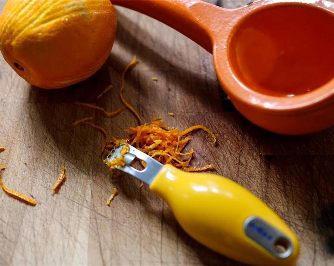 step 4 Zest and juice the Orange (1). You'll need a quarter cup of orange juice and reserve half of the zest for garnish.