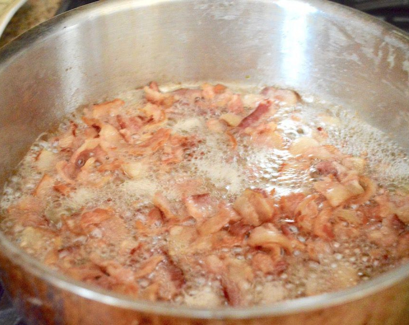 step 1 First, cook the Bacon (10 slices). Add it to a cold, large skillet with deep sides and then heat it up over medium high heat. Let it cook completely and render out the gorgeous liquid gold fat until it is crispy.