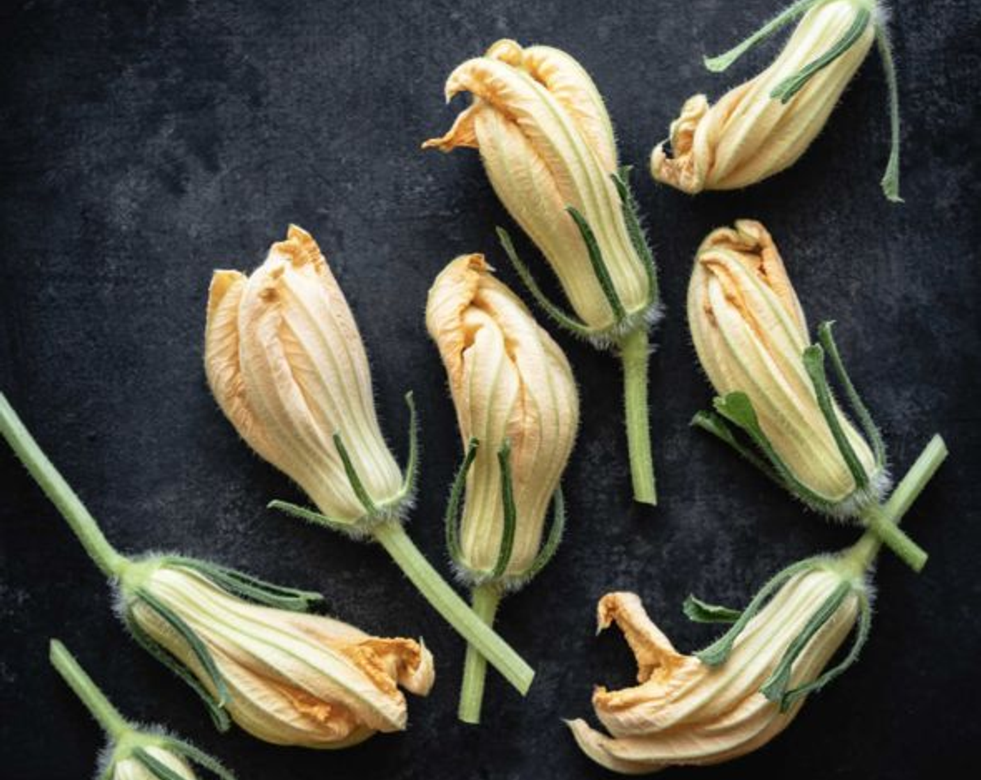 step 1 To prepare Squash Blossoms (50), gently open the petals and use your finger to snap off the pistil.