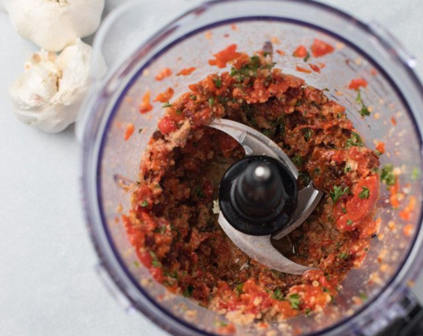 step 2 Add the Jarred Roasted Red Peppers (1 cup), Sun-Dried Tomatoes (1/2 cup), Fresh Parsley (4 Tbsp), Cayenne Pepper (1/4 tsp) and Salt (1/2 tsp) and pulse again until incorporated.