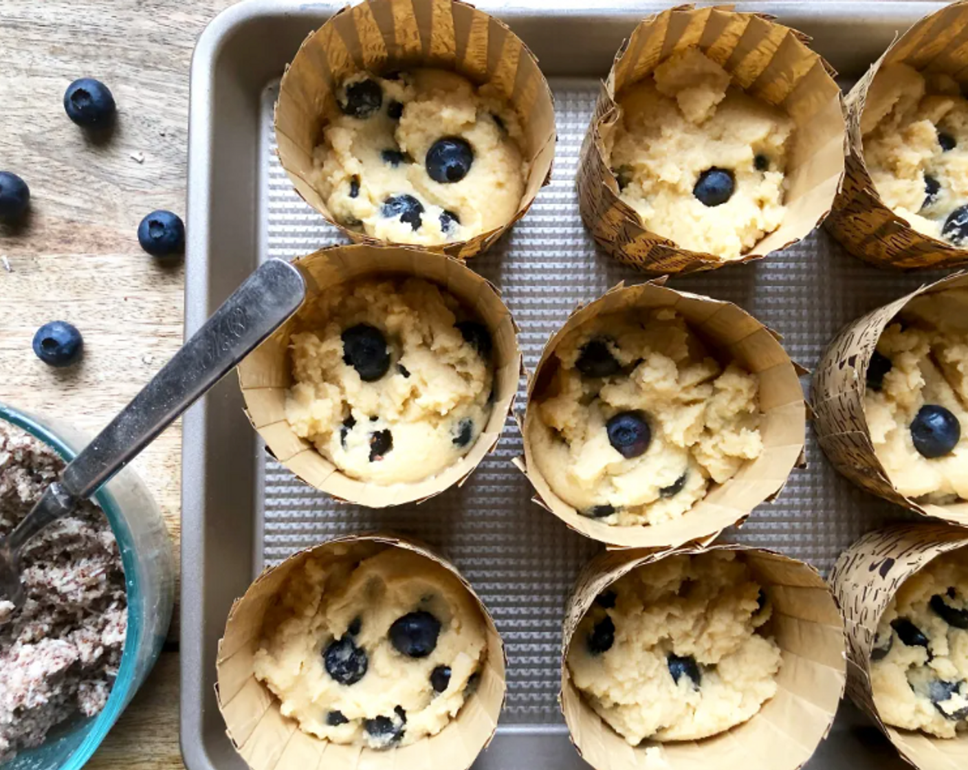 step 6 Gently fold in the Fresh Blueberry (1 cup). Scoop the batter into the prepared muffin cups and set aside.
