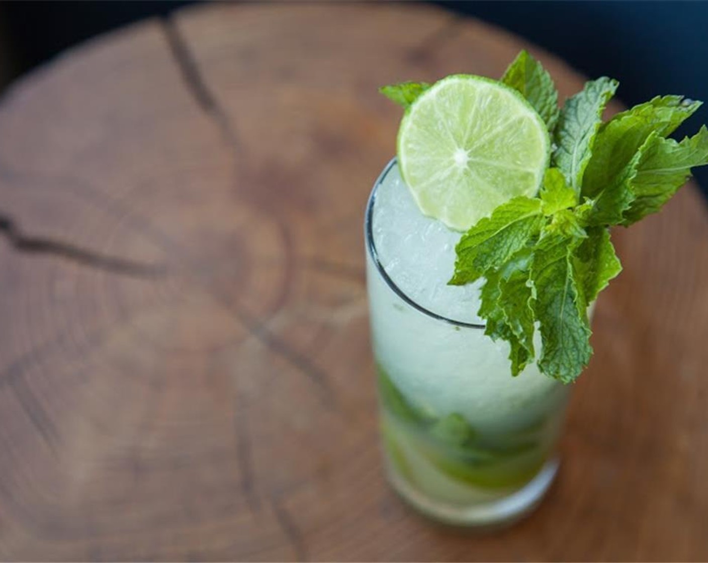 step 3 Pour into a Rocks glass and add a splash of Club Soda (to taste). Garnish with mint and lime wedges.