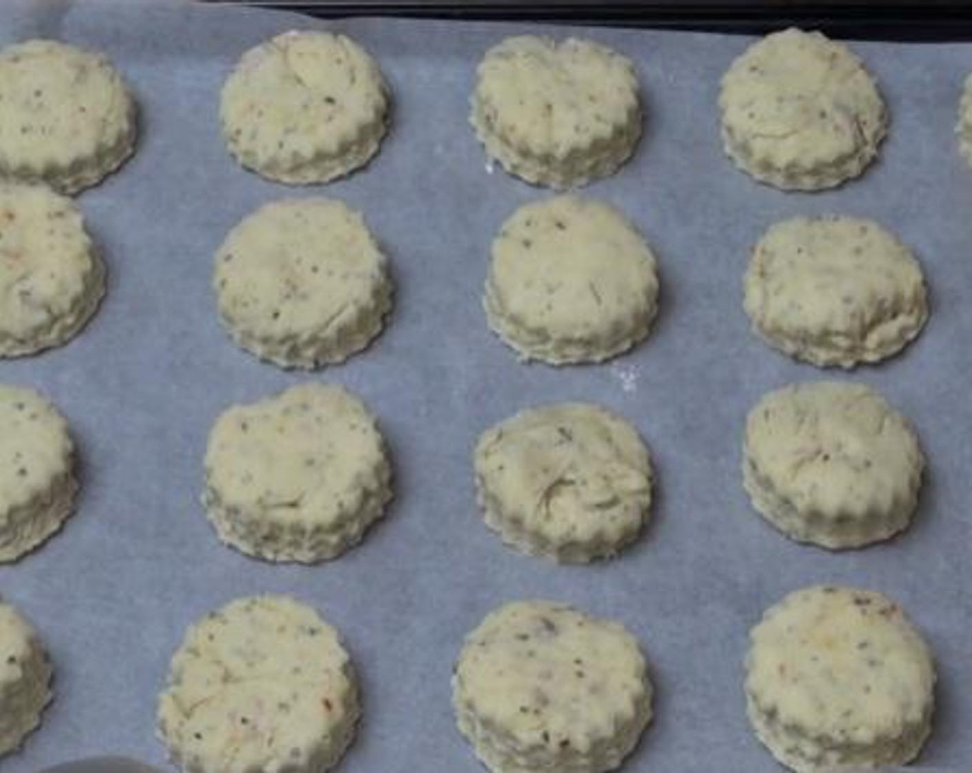 step 3 Shape the dough into a rough disc shape. And using a small cookie cutter, cut out small rounds. Transfer the cones onto a baking tray lined with baking paper. Cook inside a preheated oven at 220 degrees C (425 degrees F) for about 20 minutes.