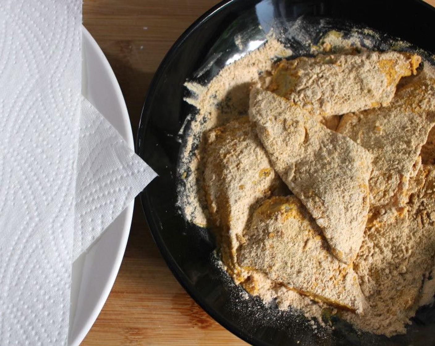 step 4 Dredge the marinated fish in the spice mixture.